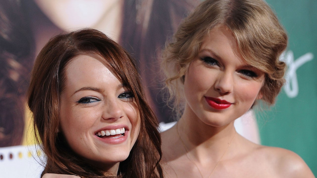 Actress Emma Stone and singer Taylor Swift arrive at the Los Angeles Premiere "Easy A" at Grauman's Chinese Theatre on September 13, 2010 in Hollywood, California.