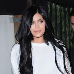 Kylie Jenner Rocks Purple Thigh-High Boots With Oversized White T-Shirt -- See Her Wild Style!