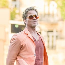 Brad Pitt Rocks an All-Orange Ensemble For 'Bullet Train' Photo Call
