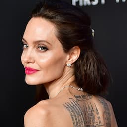 Angelina Jolie's Mystery Middle Finger Tattoos Revealed 