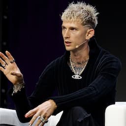 Machine Gun Kelly Jumps Up When Fan Rushes the Stage at Speaking Event