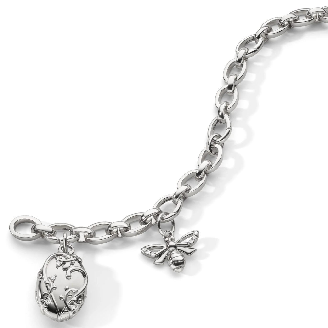 The "Wisteria" Locket and "Bee" Sterling Silver Charm Bracelet 