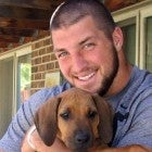 Tim Tebow Breaks Down Sobbing as He Feeds His Dog For The Last Time