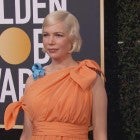 Golden Globes 2020: Michelle Williams Debuts Growing Baby Bump in Orange Gown