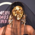 AMAs: Cardi B Sports a Gold Mask and Black Veil on the Red Carpet