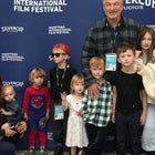 Alec and Hilaria Baldwin joined by kids on red carpet