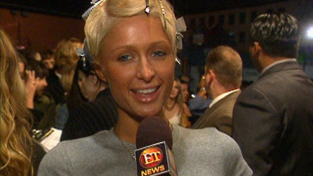 Paris Hilton Takes the Red Carpet and Interviews Christina Aguilera at 2003 Fashion Show (Flashback)