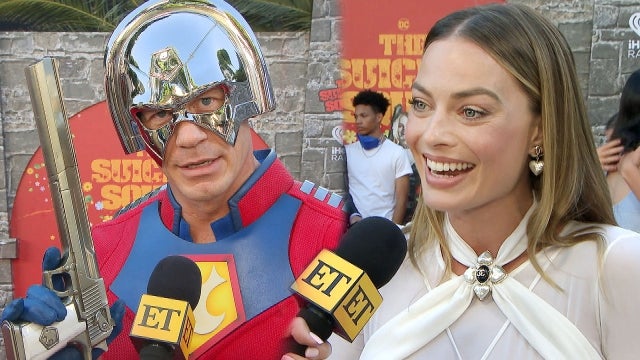 Margot Robbie Reacts to John Cena Dressing Up as Peacemaker for 'Suicide Squad' Premiere (Exclusive)