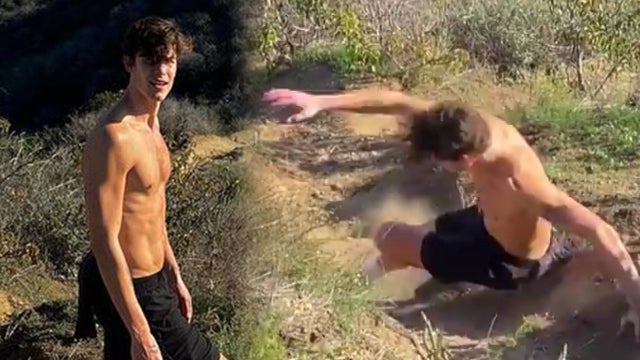 Watch Shawn Mendes Fall While Trying to Get a Shirtless Photo