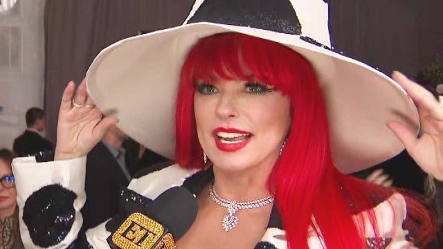 Shania Twain Explains Her Bright Red Hair on GRAMMYs Red Carpet (Exclusive)