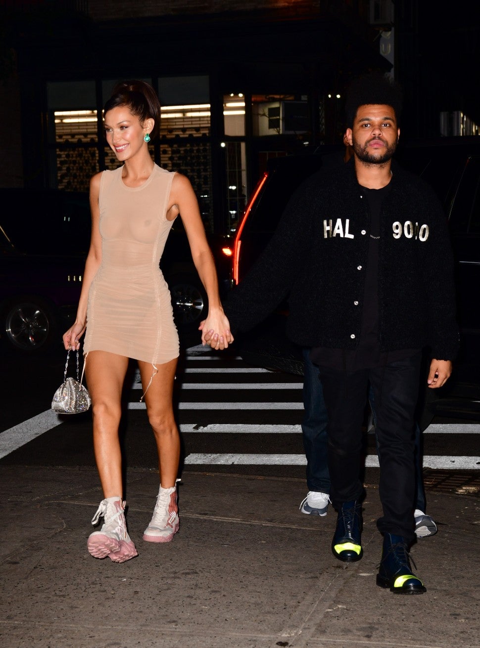 Bella Hadid and The Weeknd holding hands