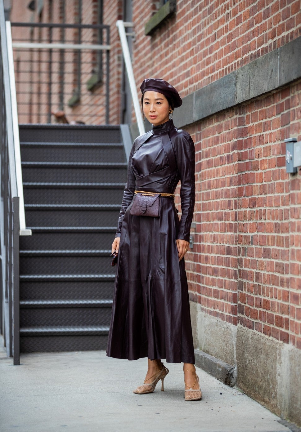 Aimee Song in leather outfit at NYFW street style
