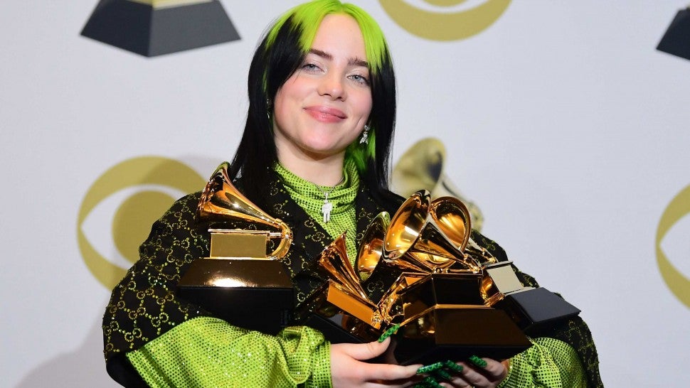 US singer-songwriter Billie Eilish poses in the press room with the awards for Album Of The Year, Record Of The Year, Best New Artist, Song Of The Year and Best Pop Vocal Album during the 62nd Annual Grammy Awards on January 26, 2020, in Los Angeles.