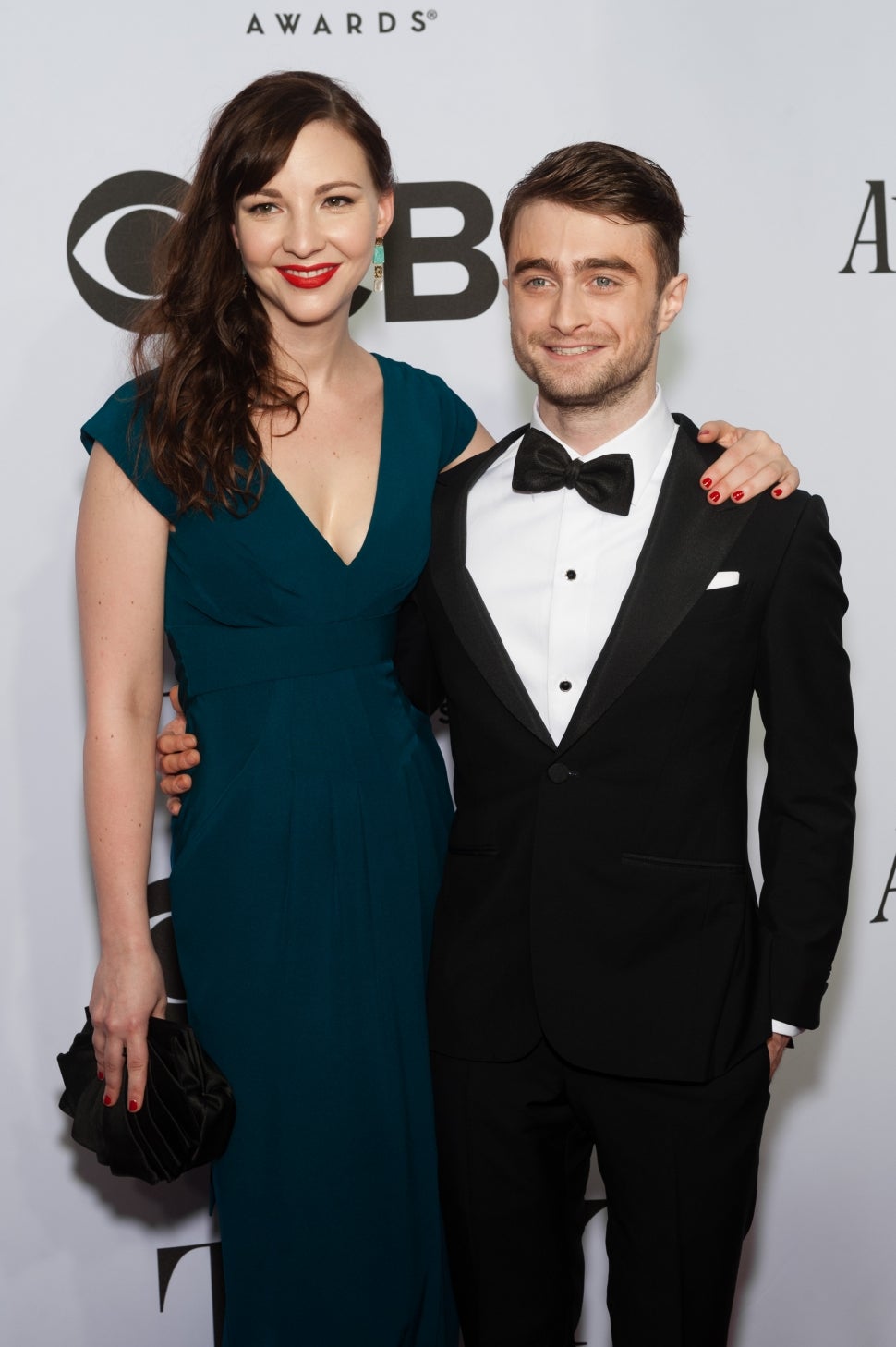 Daniel Radcliffe (R) and Erin Darke attend the American Theatre Wing's 68th Annual Tony Awards at Radio City Music Hall on June 8, 2014 in New York City.