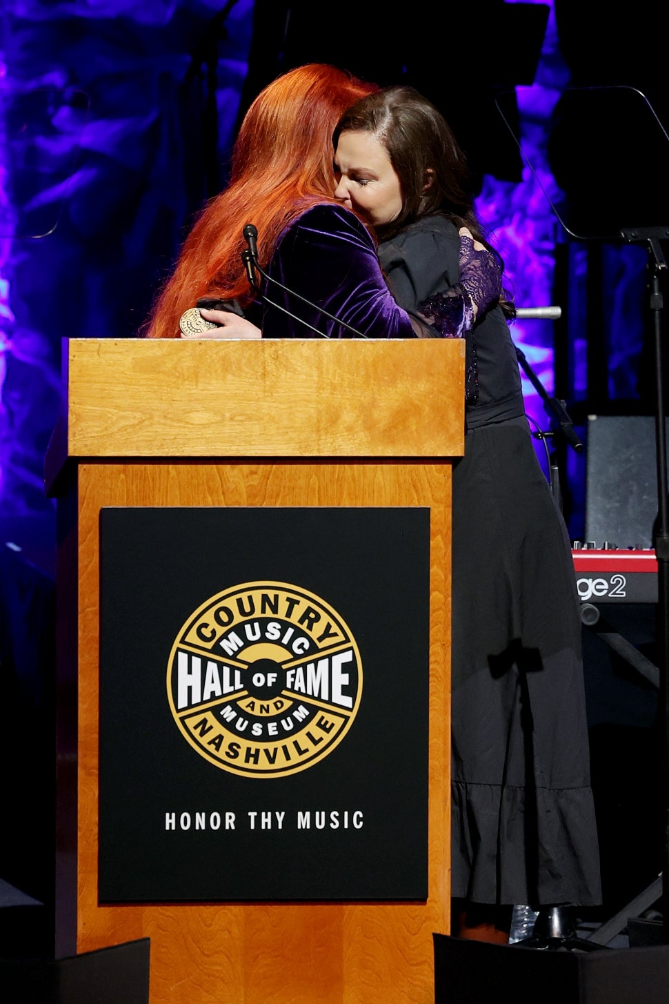 Inductee Wynonna Judd and Ashley Judd speak onstage for the class of 2021 medallion ceremony at Country Music Hall of Fame and Museum on May 01, 2022 in Nashville, Tennessee.