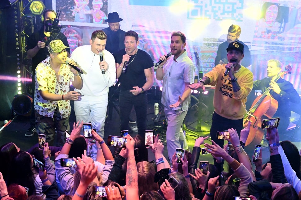 Erik-Michael Estrada, Nick Carter, Jeff Timmons, Lance Bass, and AJ McLean perform onstage during Songs For Tomorrow: A Benefit Concert
