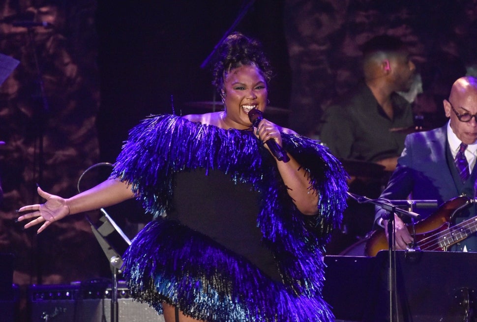 Lizzo performing at Clive Davis' pre-GRAMMY gala