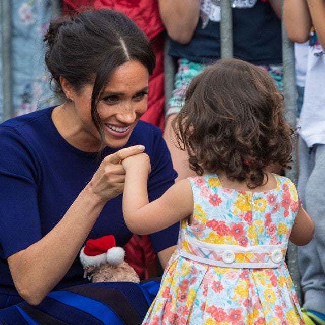 Meghan Markle with young girl in New Zealand