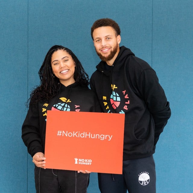 Steph and Ayesha Curry with Eat. Learn. Play. Foundation