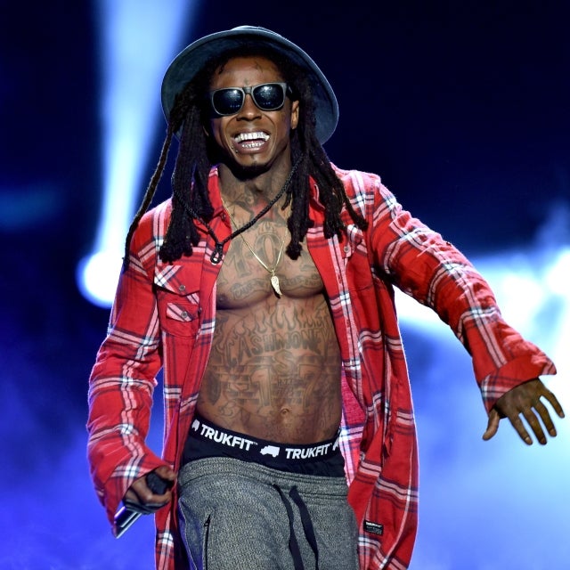 Lil Wayne performs during the BET AWARDS 2014