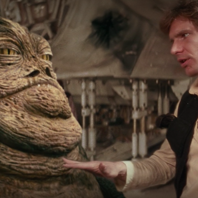 Jabba the Hutt and Han Solo converse in 'A New Hope.'