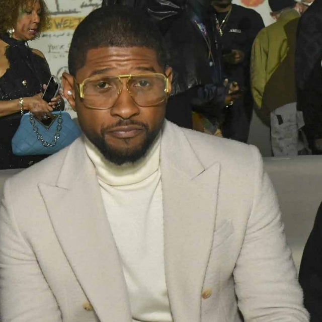 Usher and Naviyd Ely Raymond attend the AMIRI Autumn-Winter 2022 Runway Show on February 08, 2022 in Los Angeles, California.