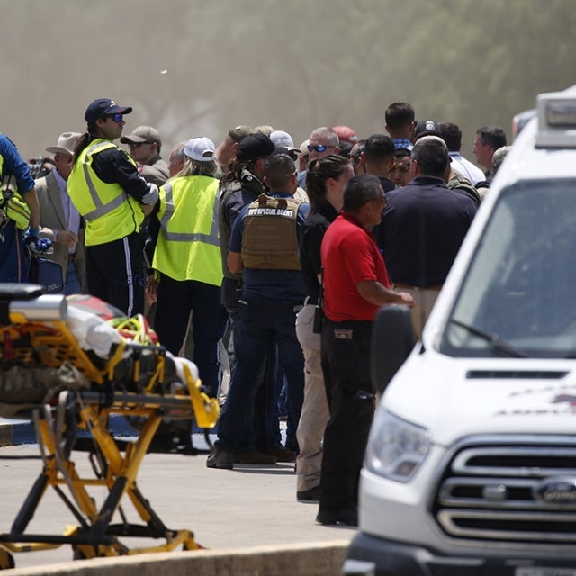 Emergency personnel gather near Robb Elementary School following a shooting, Tuesday, May 24, 2022, in Uvalde, Texas. 
