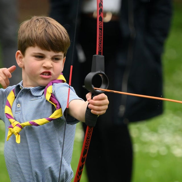  Prince Louis of Wales tries his hand at archery while taking part in the Big Help Out, during a visit to the 3rd Upton Scouts Hut in Slough on May 8, 2023 in London, England. 