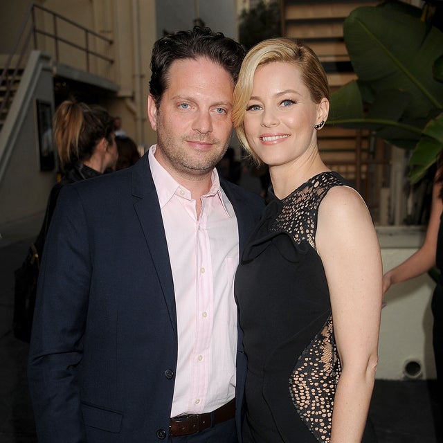 Elizabeth Banks and husband Max Handelman arrive at the Los Angeles premiere of Hulu's "Resident Advisors" at Sherry Lansing Theatre at Paramount Studios on March 31, 2015 in Los Angeles, California. 