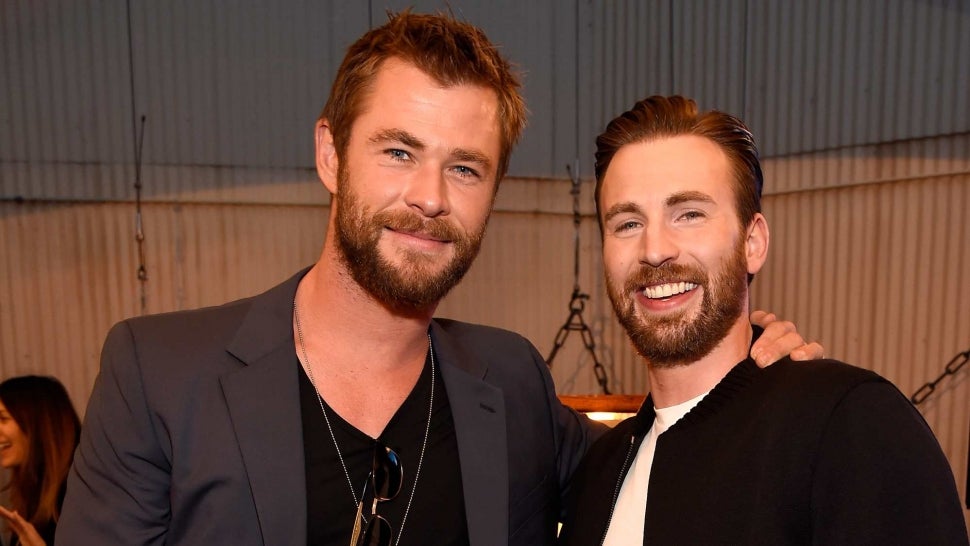 Actors Chris Hemsworth (L) and Chris Evans attend the 2016 MTV Movie Awards at Warner Bros. Studios on April 9, 2016 in Burbank, California. MTV Movie Awards airs April 10, 2016 at 8pm ET/PT.