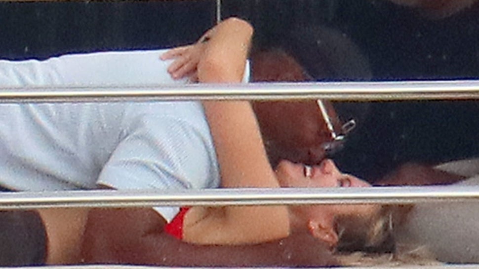 Jamie Foxx shares a daybed with mystery woman in Cannes